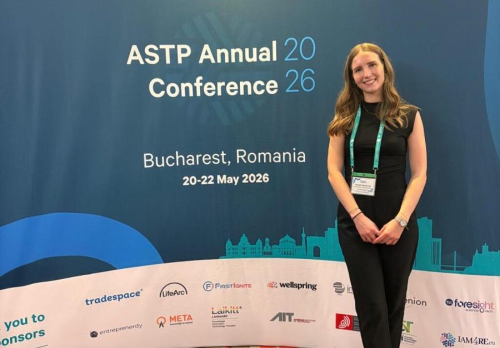 Partnership Manager at Northumbria University Elspeth MacDonald in front of ASTP Annual Conference sign